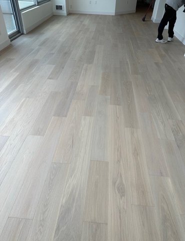 French Bros Light Wood Flooring In A Living Room