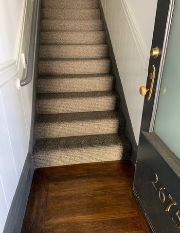 French Bros Finished Installation Rug On Stairs